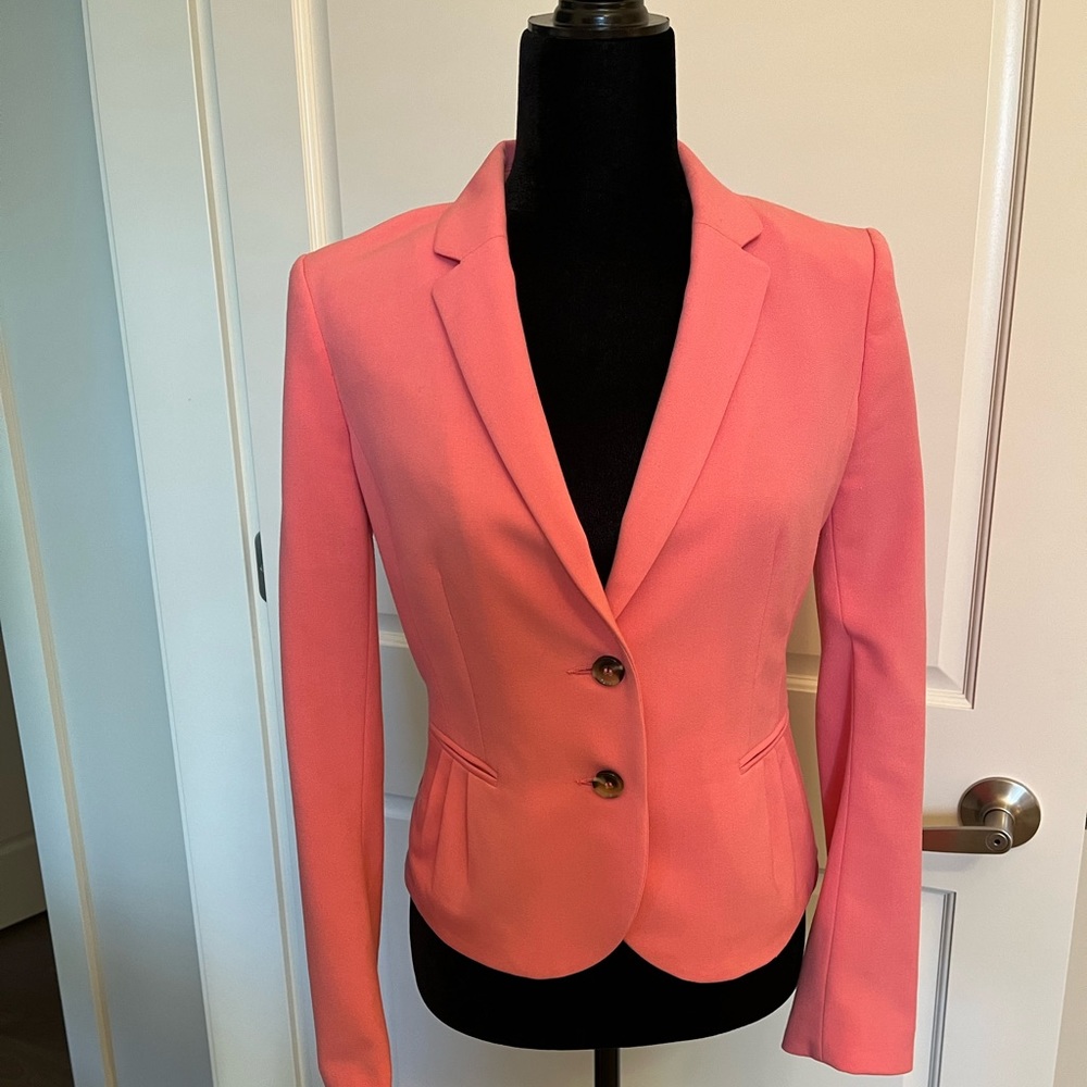 H&M Coral coloured jacket.